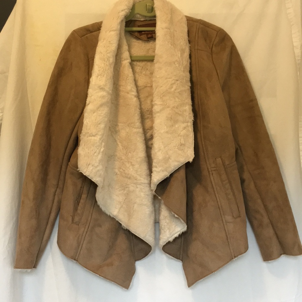 Fur coat, hive and honey